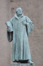 Luther monument, Martin Luther with Bible, sculpture, verdigris inscription, monument, Magdeburg,