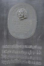 Telemann stele with relief of the composer Georg Philipp Telemann, inscription, bronze, text,