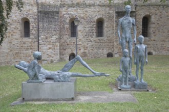 Sculpture Standing and Resting Group by Sabine Grzimek 1985, reclining and standing nude slender