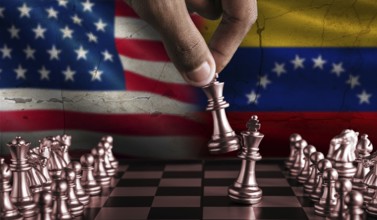 Political tension between Venezuela and USA. Venezuela vs USA flag on chessboard