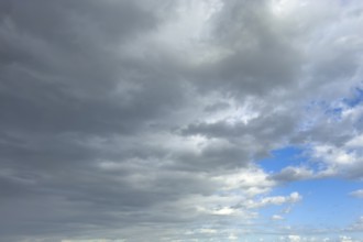 Left cold front clouds of cumulus clouds right in front altocumulus clouds and stratocumulus