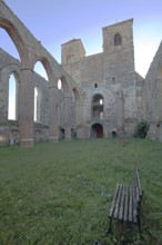 Interior view of the St. Nikolai church ruins, green lawn, nature, empty, pew, twin towers, Zerbst,