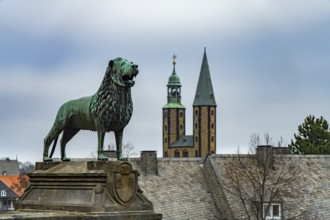Brunswick Lion of the Imperial Palace and the towers of the Market Church of St Cosmas and Damian