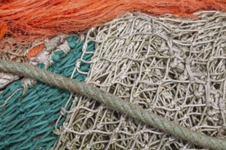 Complex structure of brightly coloured fishing nets and ropes in vivid colours, Greetsiel, East