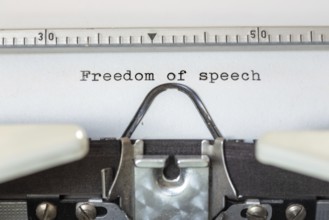 FREEDOM OF SPEECH, written with a typewriter