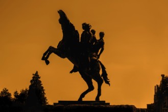 Silhouette of bronze statue of the Ros Beiaard by sculptor Jan Desmarets, folkloristic horse in the