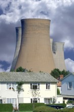 Cooling towers of a coal-fired power station next to a residential neighbourhood, Midlands,