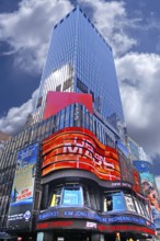 Skyscraper with illuminated advertising in Times Square, New York City, USA