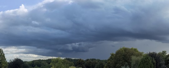 Gathering low pressure area with rain front dark stratus clouds Nimbostratus clouds, international