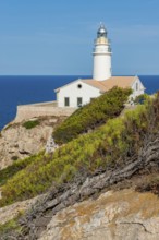 Lighthouse on Capdepera cliff on the east coast of the Mediterranean island of Majorca, blue sea in