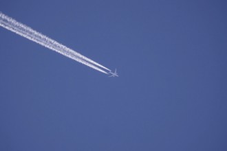 Blue sky with vapour trails, Germany