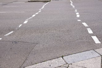 Displaced road markings, symbolic image of need for renovation, Germany