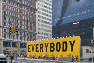 Street scene with large billboard Everybody, New York City, USA