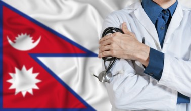 Doctor with stethoscope on Nepal flag. Doctor holding stethoscope on Nepal flag