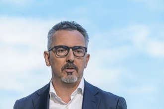 Dr Joachim Post, Member of the Board of Management of BMW AG for Development. BMW exhibition stand.