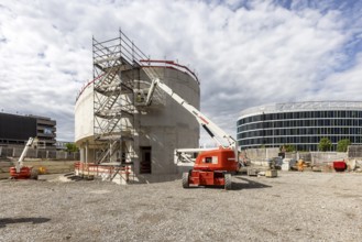 Construction site at the smaller east entrance of the new airport railway station between the
