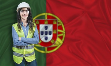 Young female construction engineer with Portugal flag. Portrait of smiling female engineer with