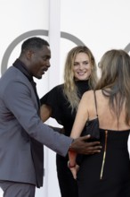 Venice, Italy - 2 September 2025: Idris Elba and Rebecca Ferguson during the red carpet of - A