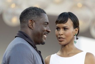 Venice, Italy - 2 September 2025: Idris Elba and Sabrina Dhowre Elba during the red carpet of - A