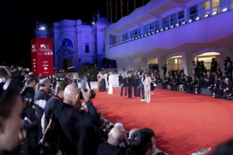 Venice, Italy - 3 September 2025: Photographers work during the red carpet of - Cartier Glory To