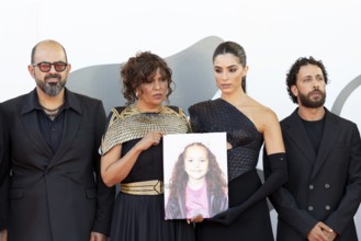 Venice, Italy - 3 September 2025: Kaouther Ben Hania and Saja Kilani with a portrait of