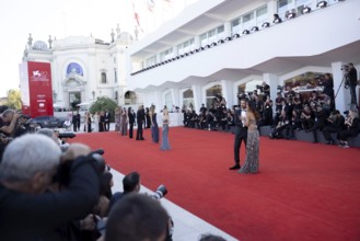 Venice, Italy - 3 September 2025: Photographers work on the red carpet and are taking pictures of