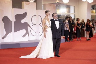 Venice, Italy - 3 September 2025: Louise Kugelberg and Julian Schnabel during the Red Carpet of -