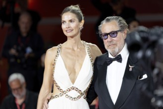 Venice, Italy - 3 September 2025: Louise Kugelberg and Julian Schnabel during the Red Carpet of -