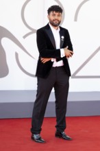 Venice, Italy - 3 September 2025: Amine Bouhafa wears a sticker in the colours of the Palestine