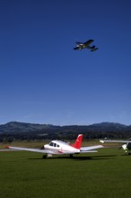 BRM Aero Bristell B23 identification aircraft registration HB-KGU taking off over Piper Archer II