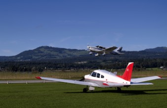 PA28 Archer II 180 HP identification aircraft registration HB-PMG during take-off over Piper Archer