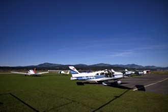 Pipistrel Velis Club on the right with aircraft registration HB-NPP stands next to Piper Archer II