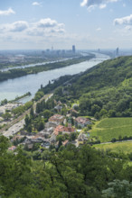 Viewpoint on the way to Leopoldskirche with a view of Kahlenbergdorf and the Danube in the