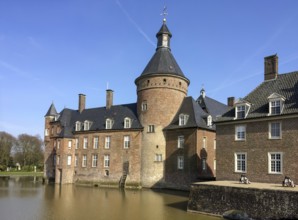 View over moat of moated castle Anholt to main castle with keep tower on the left, part of outer
