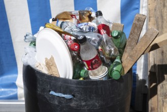 Waste bin with paper plate, pet bottles and wood, Switzerland