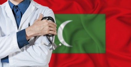 Doctor with stethoscope on Maldives flag. Doctor holding stethoscope on Maldives flag