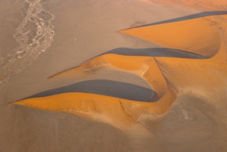 Sand dunes in the Namib Desert. In the evening. Aerial view. Namib-Naukluft Park, Namibia