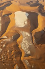 Aerial view of the Dead Vlei, a dry pan in the centre of the Namib Desert, and the surrounding sand