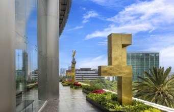 Mexico City tourist attraction Angel of Independence column near financial center and El Zocalo
