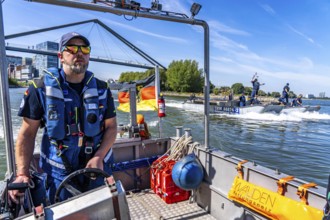 Exercise run of a multi-purpose pontoon on the Rhine, support boat of the specialist group for
