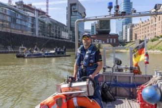 Multi-purpose boat of the THW during a training trip on the Rhine, Medienhafen in Düsseldorf, of