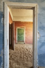 At Kolmanskop, the abandoned ghost town of the diamond days of the early 1900 and of German origin.