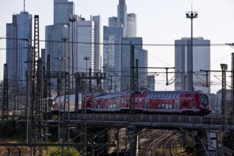 Elevated city view with Main-Spessart-Express and skyscrapers, Frankfurt am Main, Hesse, Germany
