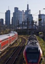 Elevated city view with many trains, railway station and skyscrapers, Frankfurt am Main, Hesse,