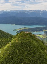 Sweeping views of lakes and mountains under a cloudy sky, Herzogstand summit, Walchensee,