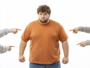 Overweight boy being judged by pointing fingers, symbolising fatshaming, bullying, judgement and