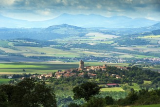 Village of Montpeyroux labelled Les Plus Beaux Villages de France and view on Sancy massif, Puy de