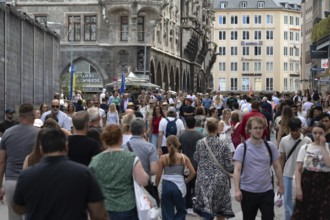 Tourists in Munich city centre, Theatiner Str. Munich, Bavaria, Germany