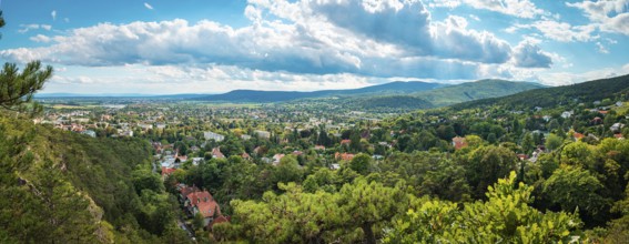 Wide panoramic view over Baden under a cloudy sky, Baden, Lower Austria, Austria
