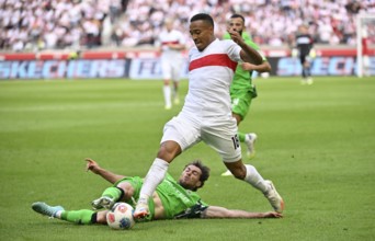 Duel, action Jamie Leweling VfB Stuttgart (18) against Joe Scally Borussia Mönchengladbach BMG (29)